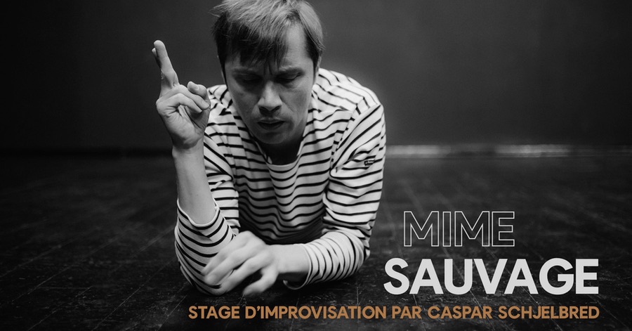 Caspar Schjelbred in a striped shirt performing a focused mime improvisation on stage.